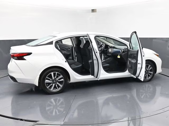2025 Aspen White Tricoat Nissan Versa 1.6 SV FWD Sedan