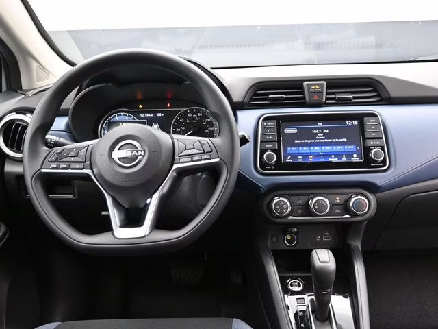 2025 Aspen White Tricoat Nissan Versa 1.6 SV FWD Sedan