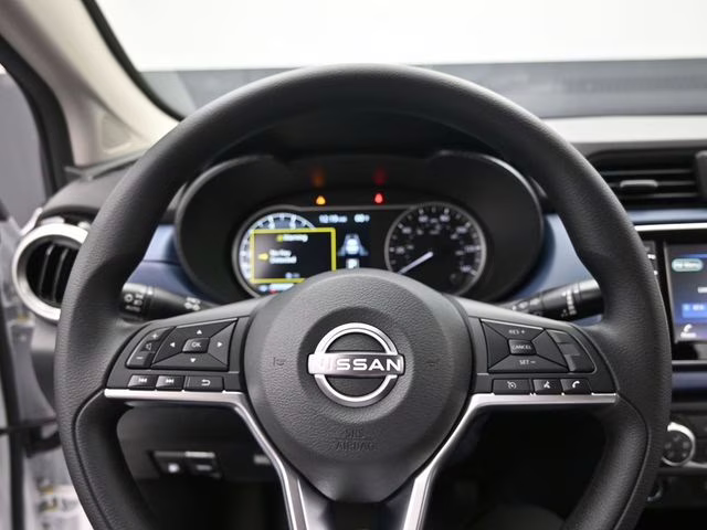 2025 Aspen White Tricoat Nissan Versa 1.6 SV FWD Sedan