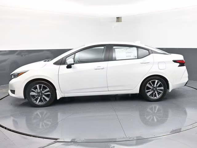 2025 Aspen White Tricoat Nissan Versa 1.6 SV FWD Sedan