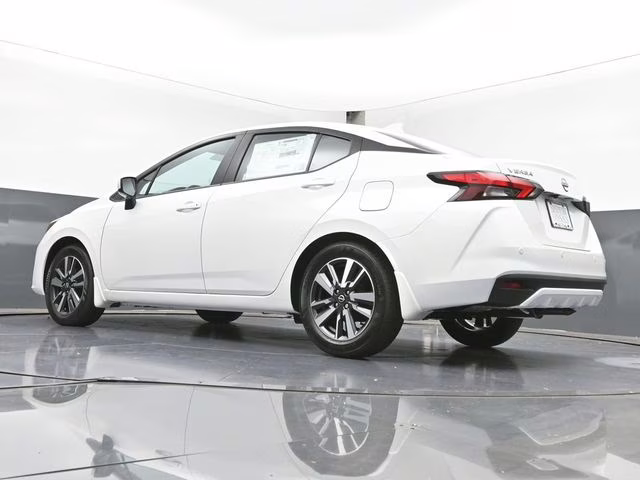 2025 Aspen White Tricoat Nissan Versa 1.6 SV FWD Sedan