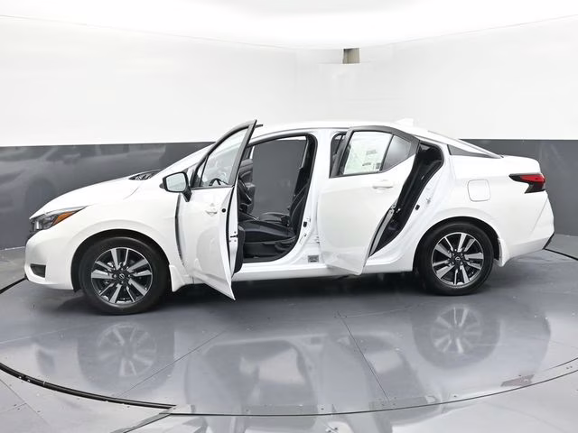 2025 Aspen White Tricoat Nissan Versa 1.6 SV FWD Sedan