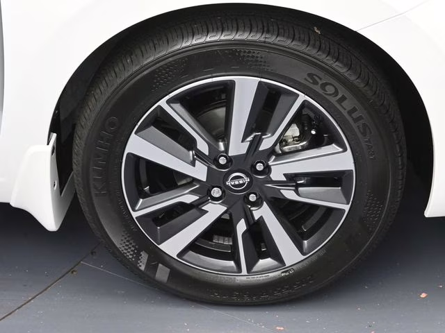 2025 Aspen White Tricoat Nissan Versa 1.6 SV FWD Sedan