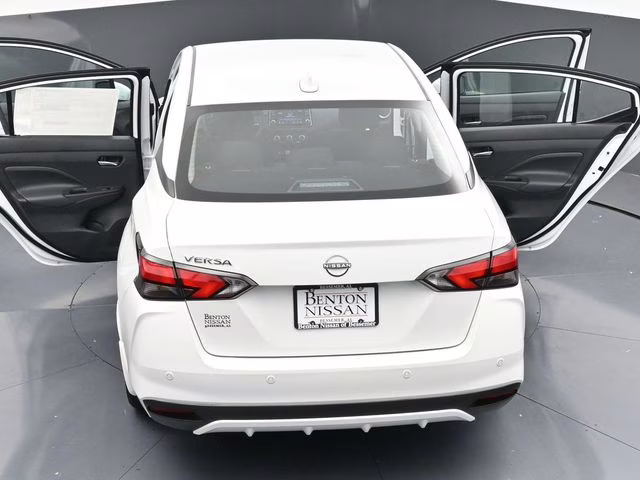 2025 Aspen White Tricoat Nissan Versa 1.6 SV FWD Sedan