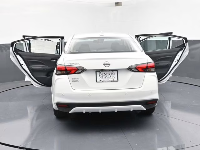 2025 Aspen White Tricoat Nissan Versa 1.6 SV FWD Sedan