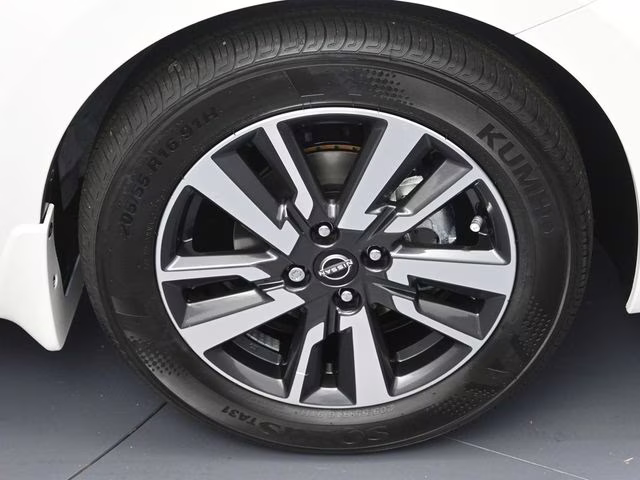 2025 Aspen White Tricoat Nissan Versa 1.6 SV FWD Sedan