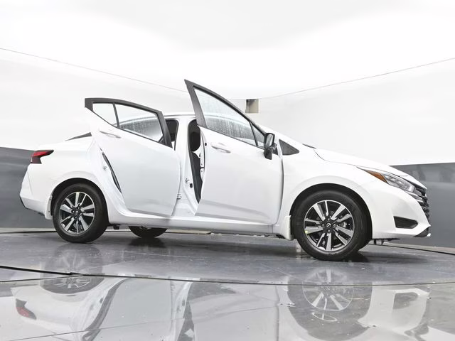 2025 Aspen White Tricoat Nissan Versa 1.6 SV FWD Sedan