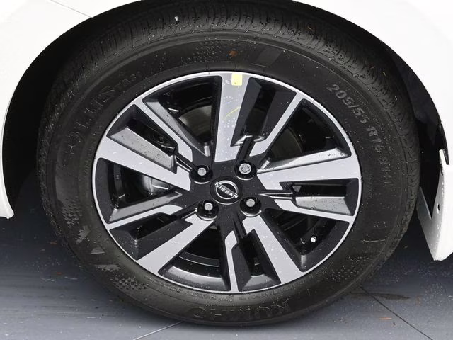 2025 Aspen White Tricoat Nissan Versa 1.6 SV FWD Sedan