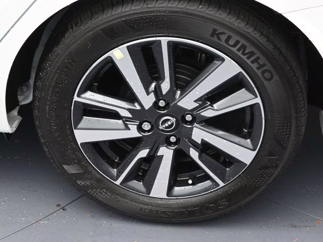 2025 Aspen White Tricoat Nissan Versa 1.6 SV FWD Sedan