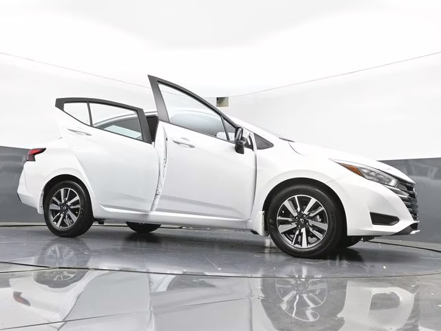 2025 Aspen White Tricoat Nissan Versa 1.6 SV FWD Sedan