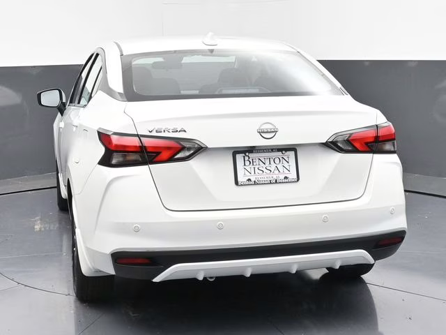 2025 Aspen White Tricoat Nissan Versa 1.6 SV FWD Sedan