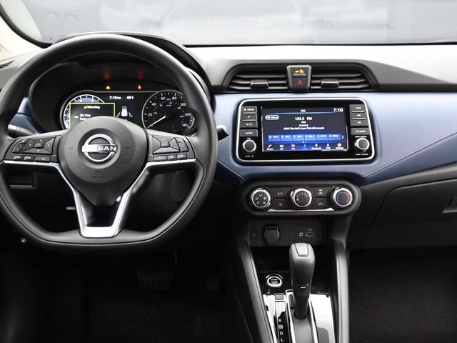 2025 Aspen White Tricoat Nissan Versa 1.6 SV FWD Sedan