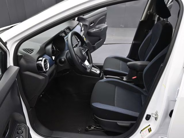 2025 Aspen White Tricoat Nissan Versa 1.6 SV FWD Sedan