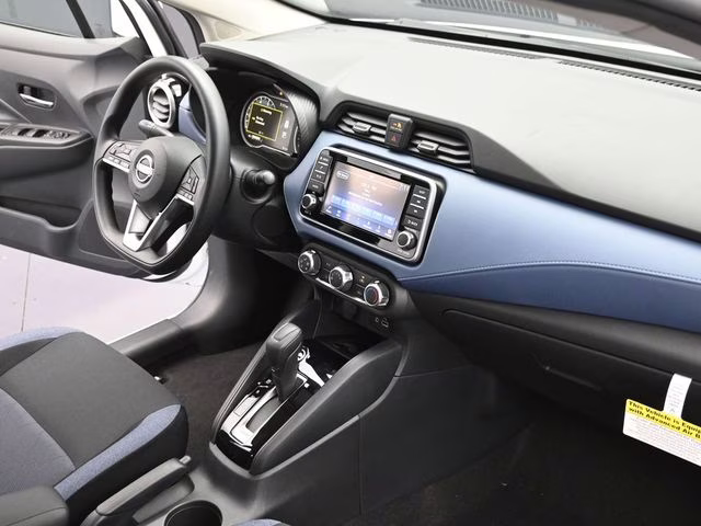 2025 Aspen White Tricoat Nissan Versa 1.6 SV FWD Sedan