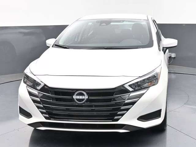 2025 Aspen White Tricoat Nissan Versa 1.6 SV FWD Sedan