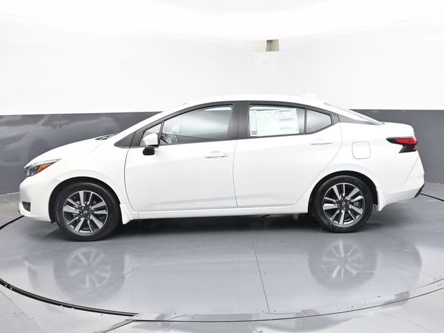 2025 Aspen White Tricoat Nissan Versa 1.6 SV FWD Sedan