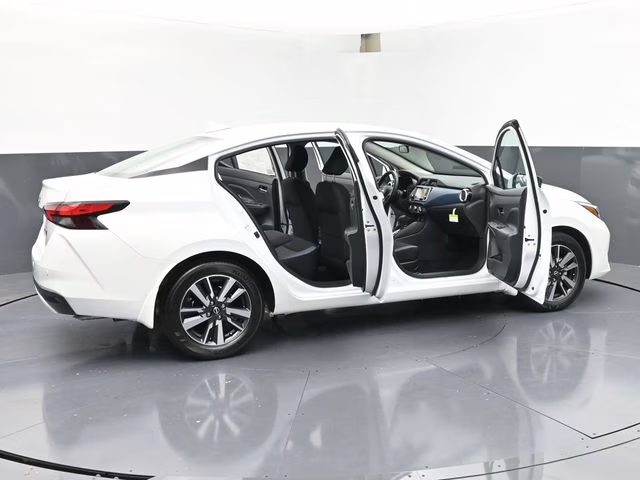 2025 Aspen White Tricoat Nissan Versa 1.6 SV FWD Sedan