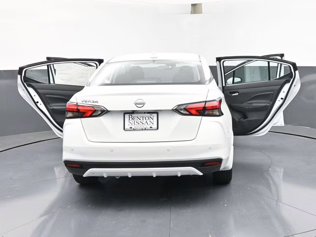 2025 Aspen White Tricoat Nissan Versa 1.6 SV FWD Sedan