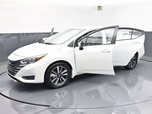 2025 Aspen White Tricoat Nissan Versa 1.6 SV FWD Sedan