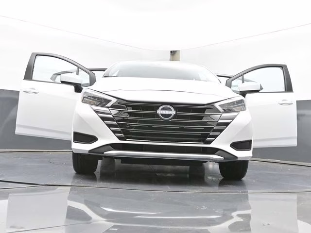 2025 Aspen White Tricoat Nissan Versa 1.6 SV FWD Sedan