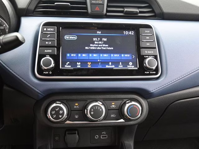 2025 Aspen White Tricoat Nissan Versa 1.6 SV FWD Sedan