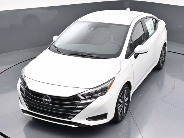 2025 Aspen White Tricoat Nissan Versa 1.6 SV FWD Sedan