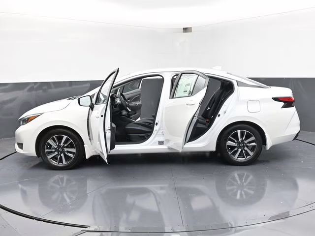 2025 Aspen White Tricoat Nissan Versa 1.6 SV FWD Sedan