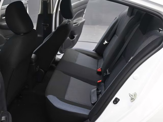 2025 Aspen White Tricoat Nissan Versa 1.6 SV FWD Sedan