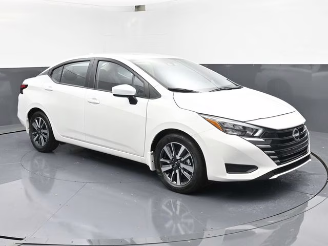 2025 Aspen White Tricoat Nissan Versa 1.6 SV FWD Sedan