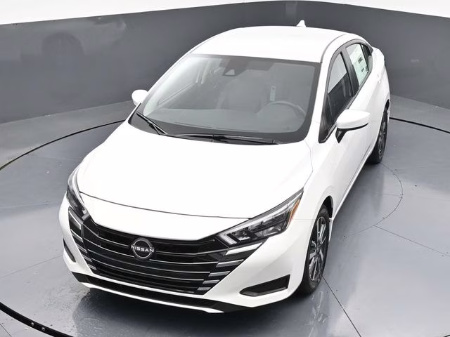 2025 Aspen White Tricoat Nissan Versa 1.6 SV FWD Sedan
