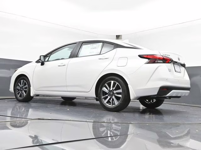 2025 Aspen White Tricoat Nissan Versa 1.6 SV FWD Sedan