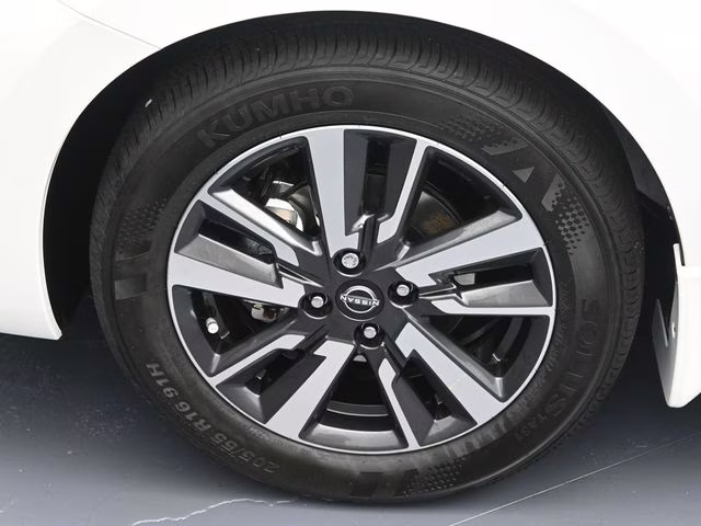 2025 Aspen White Tricoat Nissan Versa 1.6 SV FWD Sedan