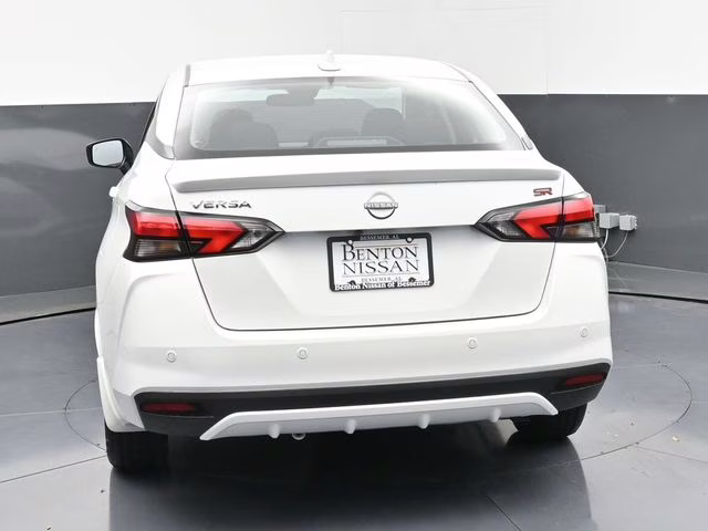 2025 Aspen White Tricoat Nissan Versa 1.6 SR FWD Sedan