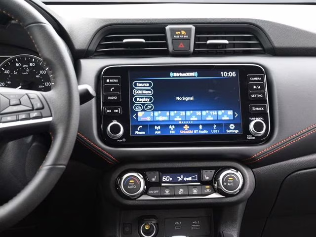 2025 Scarlet Ember Tintcoat Nissan Versa 1.6 SR FWD Sedan