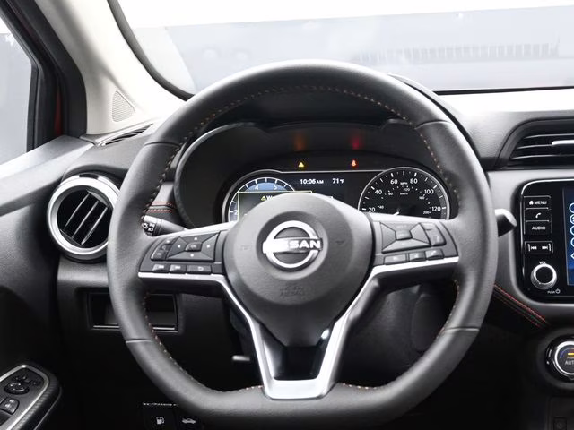 2025 Scarlet Ember Tintcoat Nissan Versa 1.6 SR FWD Sedan