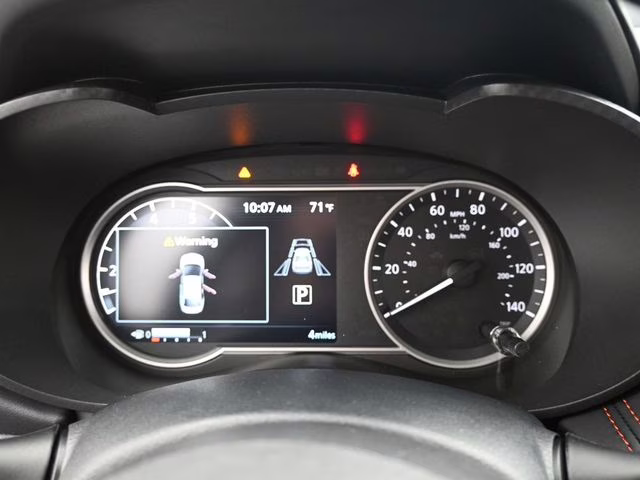 2025 Scarlet Ember Tintcoat Nissan Versa 1.6 SR FWD Sedan