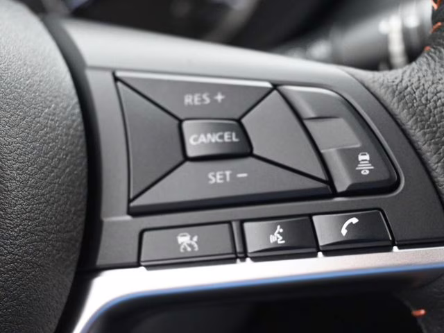 2025 Scarlet Ember Tintcoat Nissan Versa 1.6 SR FWD Sedan