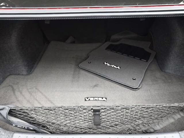 2025 Scarlet Ember Tintcoat Nissan Versa 1.6 SR FWD Sedan