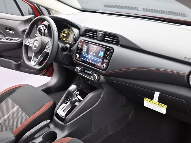 2025 Scarlet Ember Tintcoat Nissan Versa 1.6 SR FWD Sedan