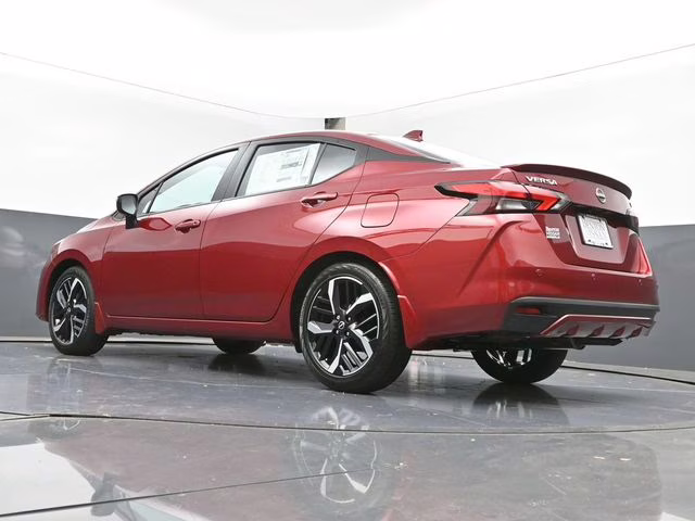 2025 Scarlet Ember Tintcoat Nissan Versa 1.6 SR FWD Sedan