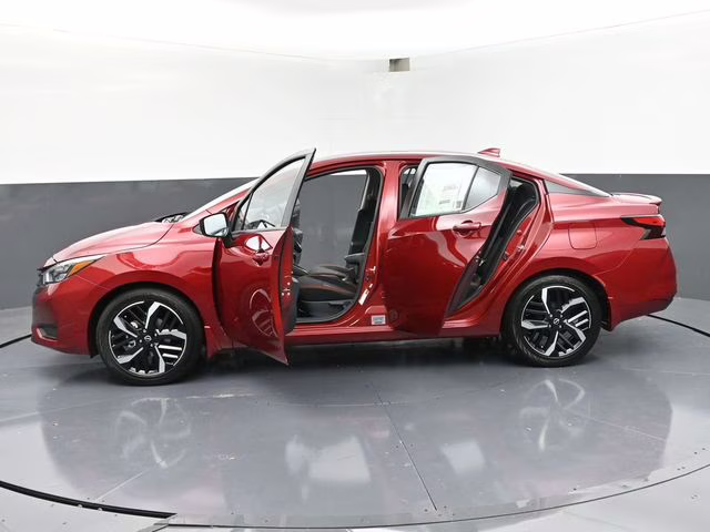 2025 Scarlet Ember Tintcoat Nissan Versa 1.6 SR FWD Sedan