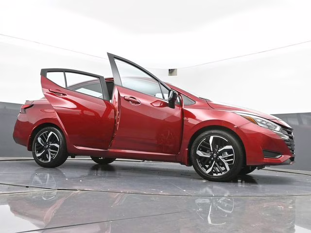 2025 Scarlet Ember Tintcoat Nissan Versa 1.6 SR FWD Sedan