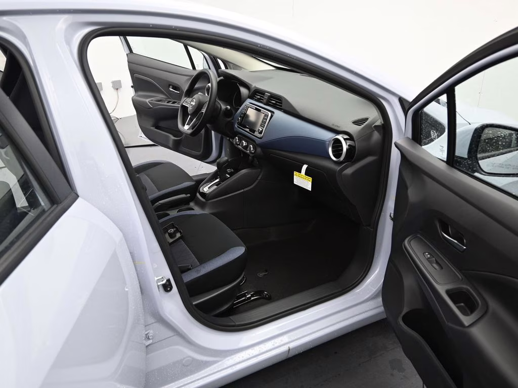 2025 Gray Sky Pearl Nissan Versa 1.6 SV FWD Sedan