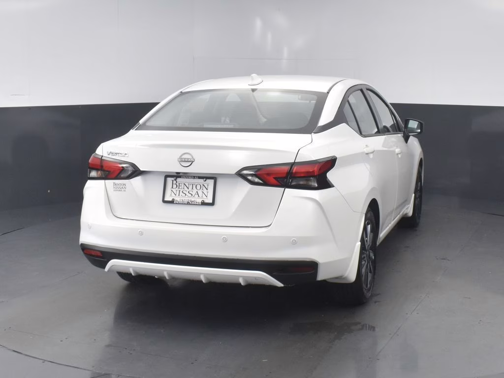 2025 Aspen White Tricoat Nissan Versa 1.6 SV FWD Sedan