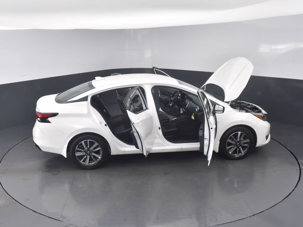 2025 Aspen White Tricoat Nissan Versa 1.6 SV FWD Sedan