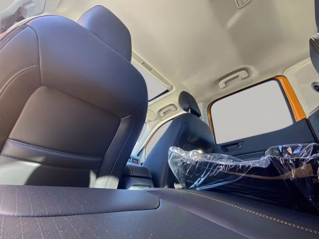 2026 Orange Fury Metallic Tri-Coat Ford Maverick Tremor AWD Truck