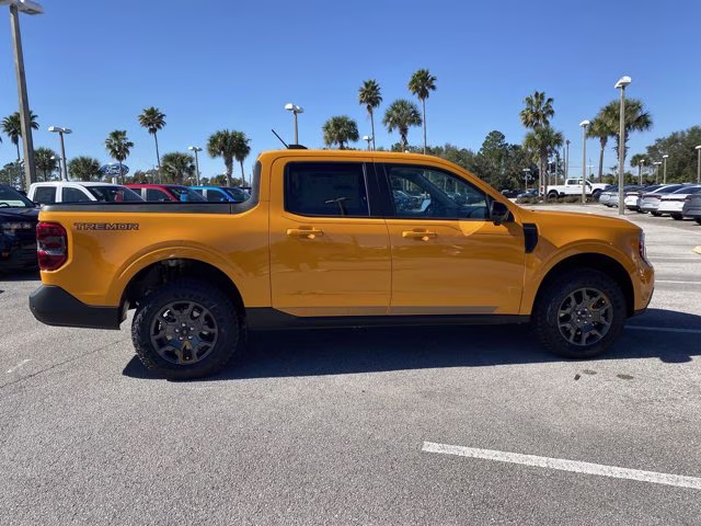 2026 Orange Fury Metallic Tri-Coat Ford Maverick Tremor AWD Truck