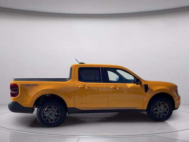 2026 Orange Fury Metallic Tri-Coat Ford Maverick Tremor AWD Truck