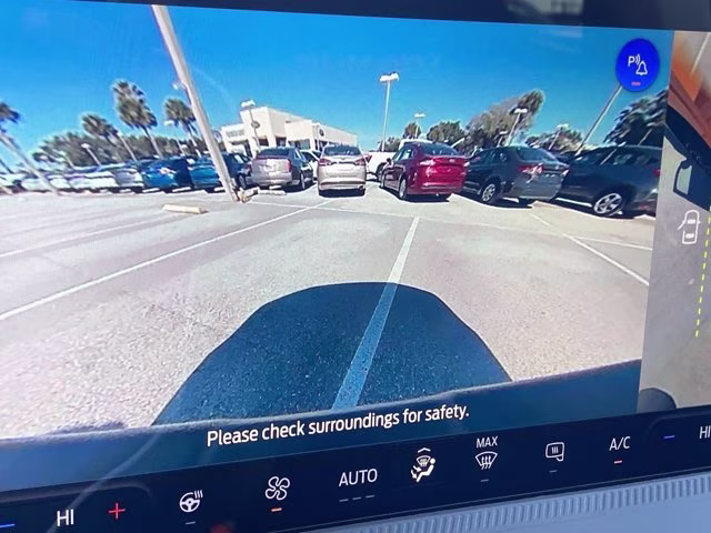 2026 Orange Fury Metallic Tri-Coat Ford Maverick Tremor AWD Truck