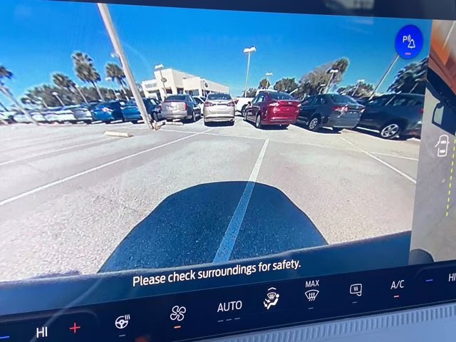 2026 Orange Fury Metallic Tri-Coat Ford Maverick Tremor AWD Truck